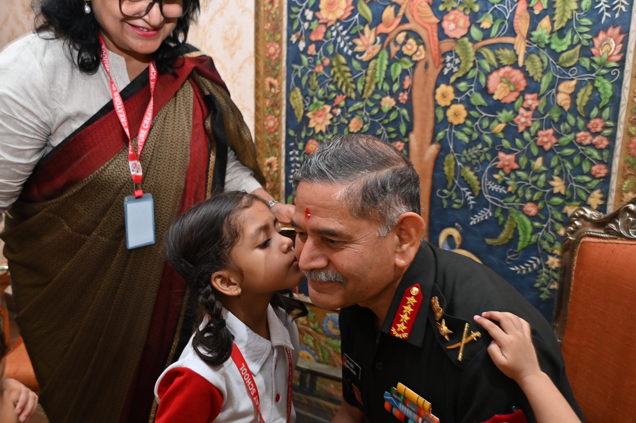 'CHILDREN TIE RAKHI TO ARMY CHIEF , A SACRED BOND OF PROTECTION AND TRUST'