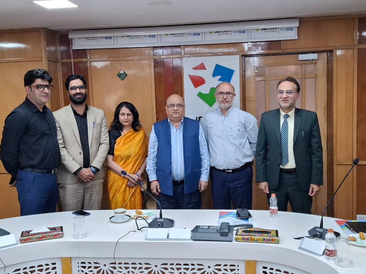 'J&K Bank gives a warm send-off to its two Deputy General Managers'